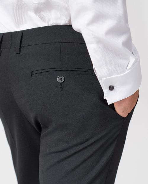 Pantalón de vestir realizado en una plana lisa de lana mezcla elástica
