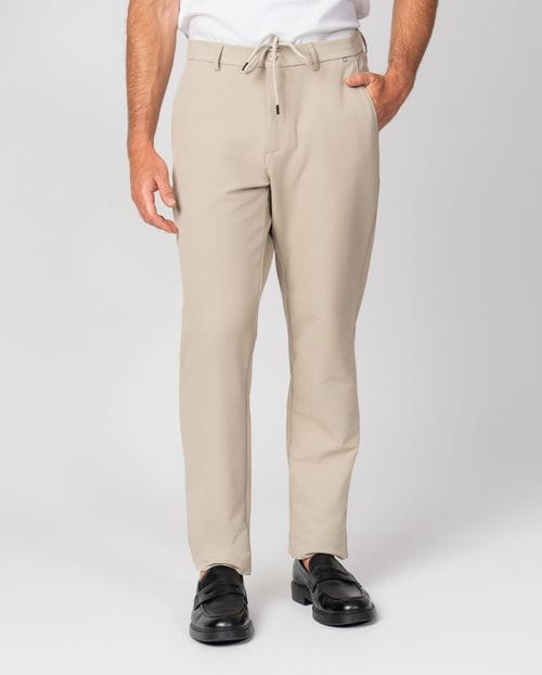 Trousers with drawstring and elastic waistband, made of stretch technical fabric