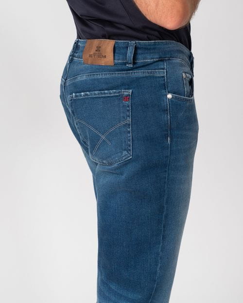 Regular fit stretch denim with a distressed 'used' finish