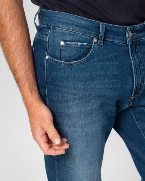 Regular fit stretch denim with a distressed 'used' finish