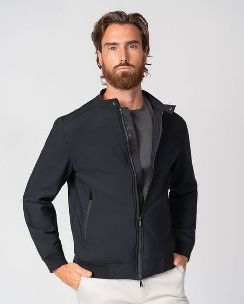 Black bomber jacket with stand collar in technical knit fabric