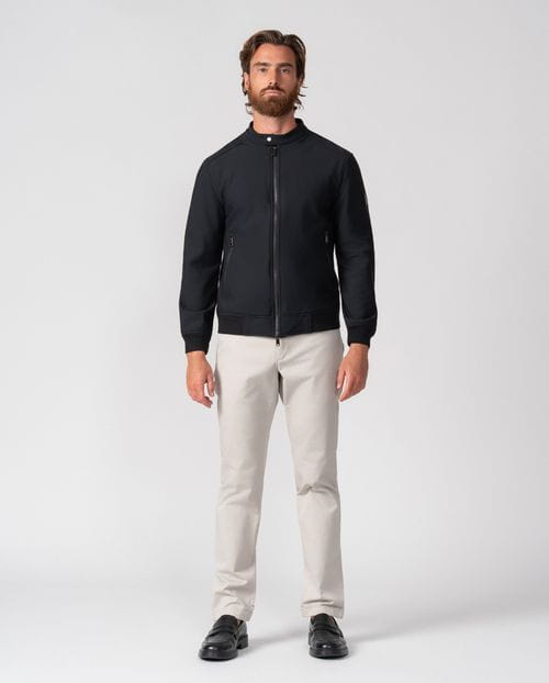 Black bomber jacket with stand collar in technical knit fabric