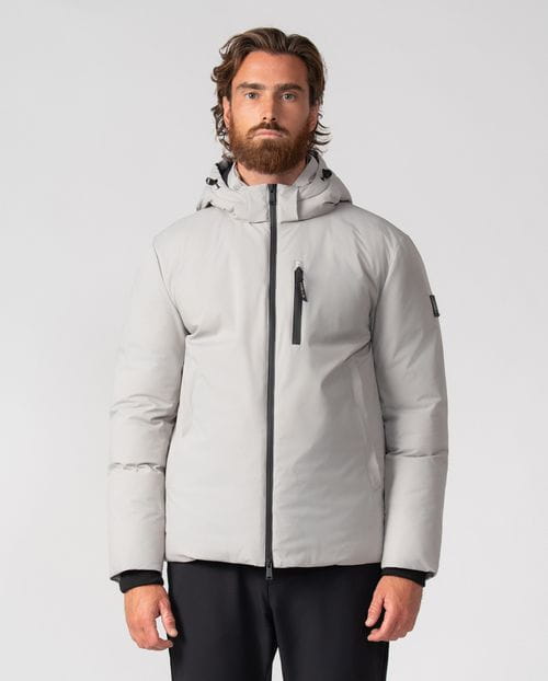 Cazadora ultraligera de capucha desmontable en tejido técnico elástico water repellent