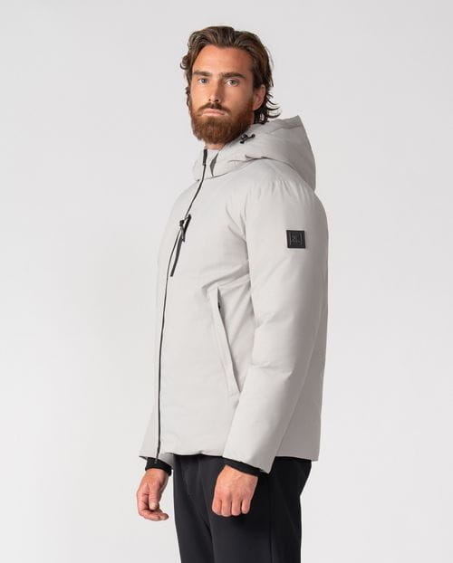 Cazadora ultraligera de capucha desmontable en tejido técnico elástico water repellent