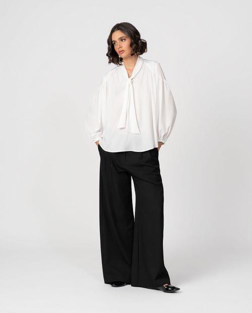 Romantic-style blouse with gathers and a tie neck detail in textured satin fabric