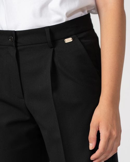 Pantalón ancho de pinzas en sarga afranelada elástica lavable