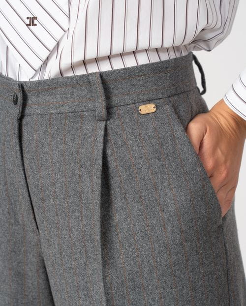 Masculine-style pleated trousers in pinstripe flannel