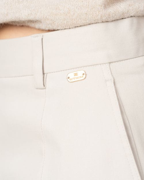 <p>Sporty barrel-leg trousers in elastic cotton 'peach feel' fabric</p>