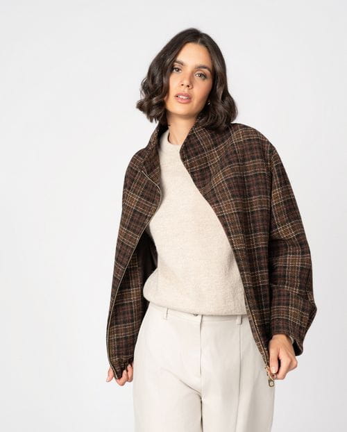 Blouson-style coat with funnel collar and front zipper crafted from Tartan virgin wool fabric