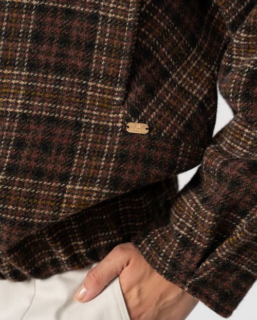 Blouson-style coat with funnel collar and front zipper crafted from Tartan virgin wool fabric