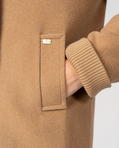 Long coat with shawl collar and knitted cuffs in wool mouflon
