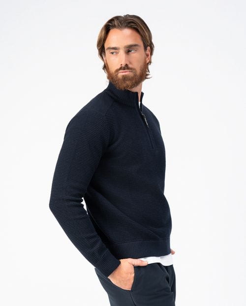 <p>Combined structure-ribbed pullover with high neck and zip</p>