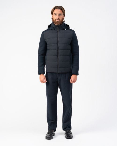 <p>Quilted jacket combining technical fabric and knit, with detachable hood</p>