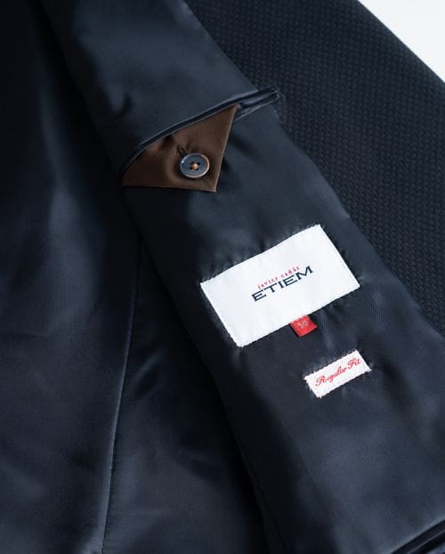 Blazer type jacket of elastic wool blend structure