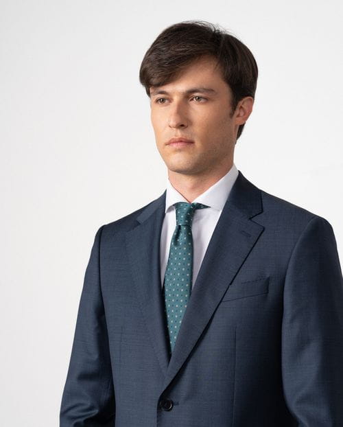 Slim fit suit of false plain 100% wool fabric
