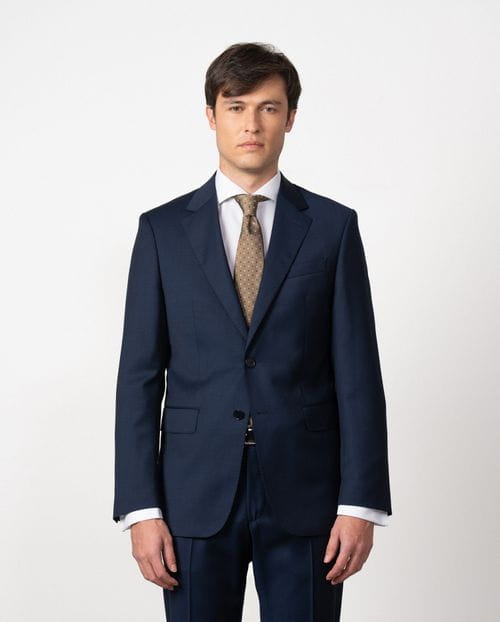 Slim fit suit of false plain 100% wool fabric