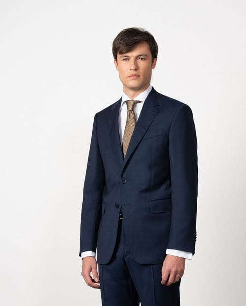 Slim fit suit of false plain 100% wool fabric