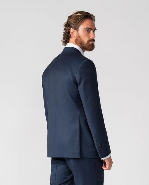 Slim fit suit of false plain 100% wool fabric