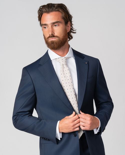 Slim fit suit of false plain 100% wool fabric