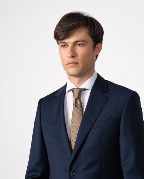 Slim fit suit of false plain 100% wool fabric