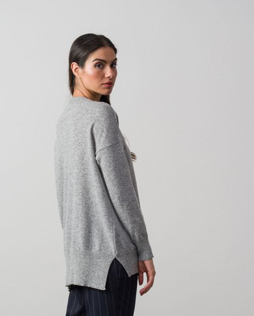 Loose-fitting  wool sweater with dropped shoulder and round collar