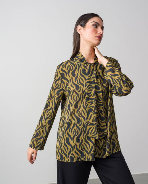 Flowing printed blouse with knotted collar
