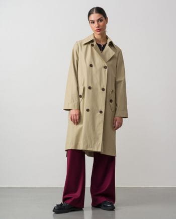 Double-breasted hoodded garment in water-repellent fabric