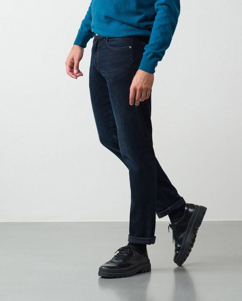 Slim fit elastic black-blue jeans with washed zones and whiskering effect