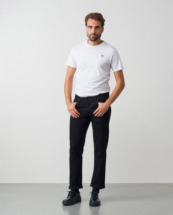 Slim fit elastic black jeans with washed zones and whiskering effect
