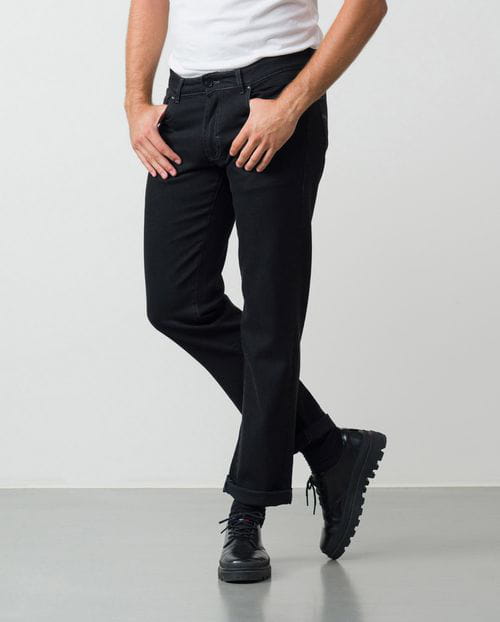Slim fit elastic black jeans with washed zones and whiskering effect