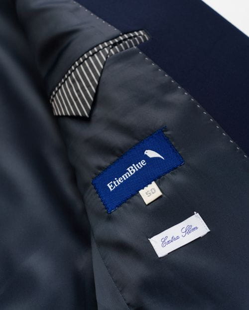 Extra-slim fit suit of elastic plain fabric