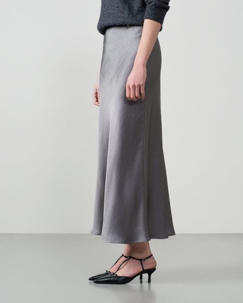 Bias-cut satin midi skirt featuring an internal branded elastic waistband