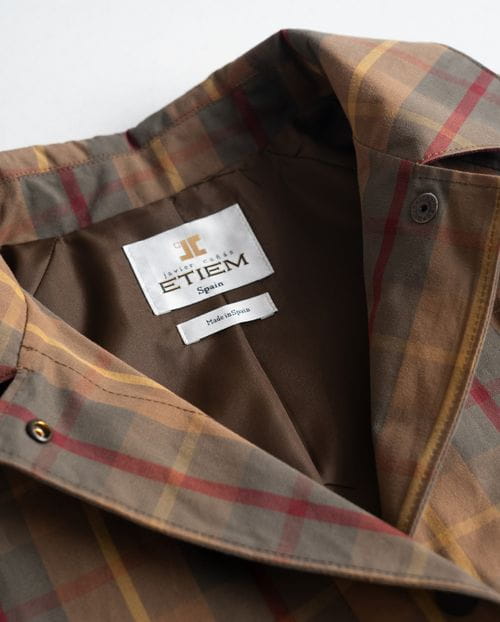 Combined check trench coat with waxed finish and water-repellent cotton twill