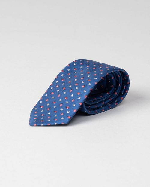 Corbata de seda con pequeño estampado de mariquitas y flores