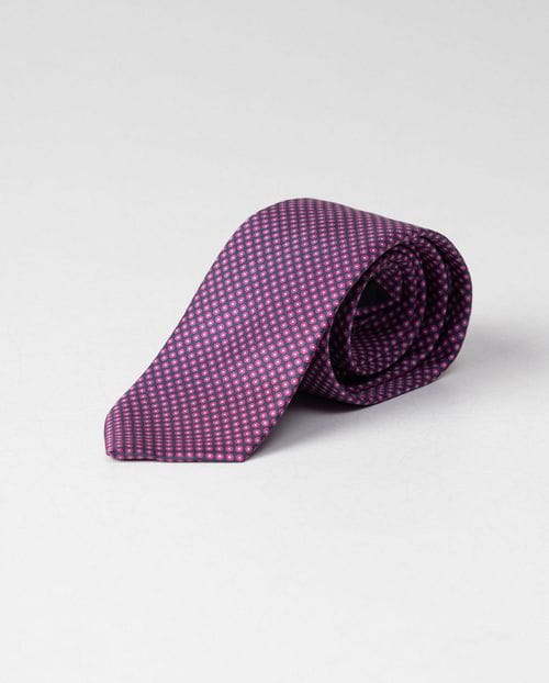 Silk tie printed in small bicolour circles