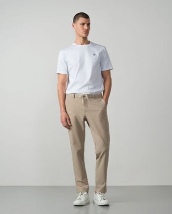 Sport trousers with cord and elastic waistbrand made of flexible technical fabric