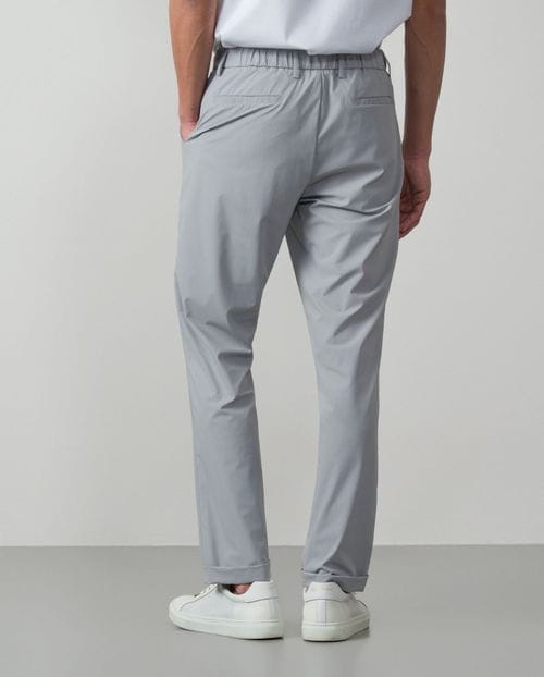 Trousers with cord and elastic waistbrand made of flexible technical fabric