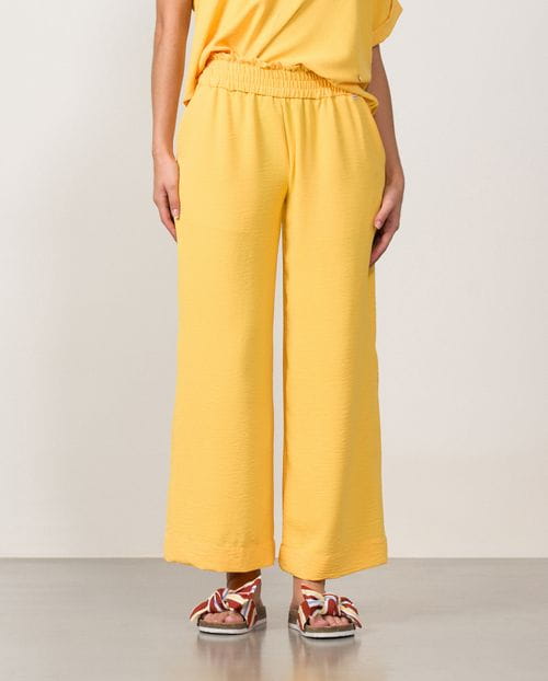 Pantalón tobillero de pierna ancha y cintura elástica