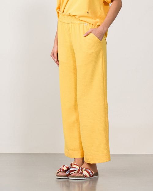 Pantalón tobillero de pierna ancha y cintura elástica