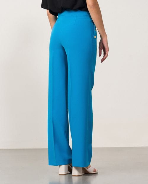 Pantalón estilo 'palazzo' con botones dorados