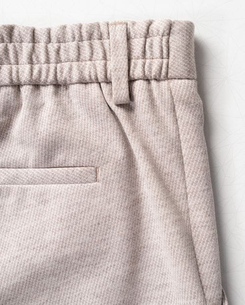Sport trousers with cord and elastic waistband made of knitted twill structure