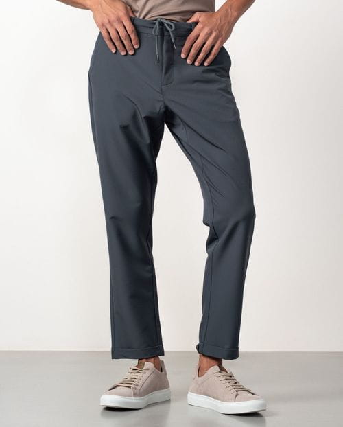 Trousers with cord and elastic waistband made of elastic technical fabric
