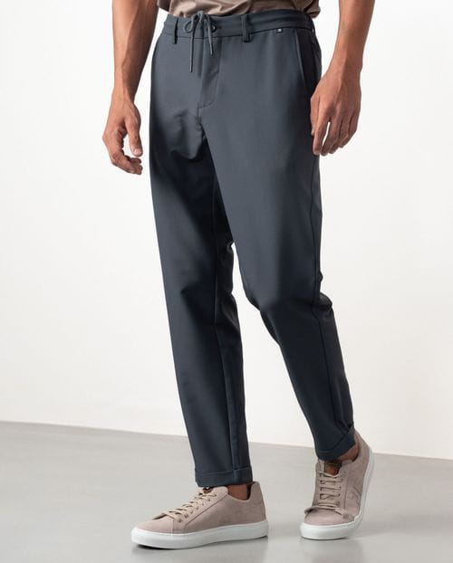 Trousers with cord and elastic waistband made of elastic technical fabric