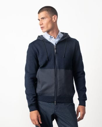 Chaqueta-cazadora combinada de punto y tejido técnico, con capucha y cremallera