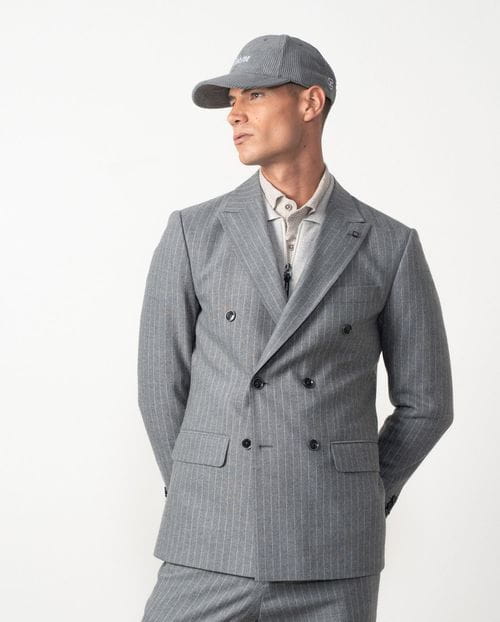 <p>Americana cruzada <em>slim fit desestructurada</em> en franela elástica de raya diplomática</p>