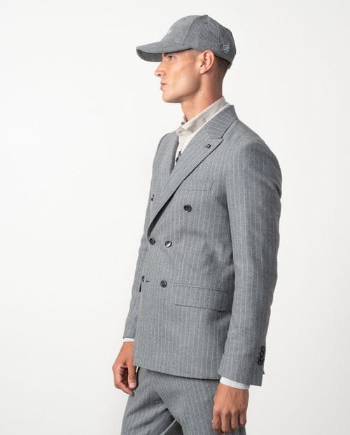 <p>Americana cruzada <em>slim fit desestructurada</em> en franela elástica de raya diplomática</p>