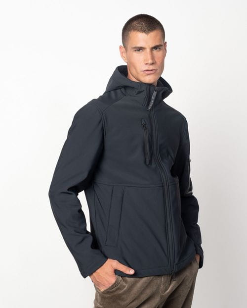 Hooded jacket made from a double knit and fleece fabric with many technical design details