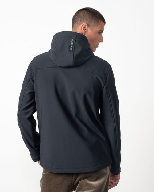 Hooded jacket made from a double knit and fleece fabric with many technical design details