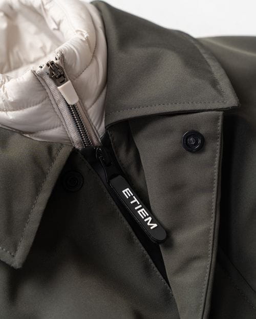 Short quilted trench coat with detachable vest in waterrepellent fabric