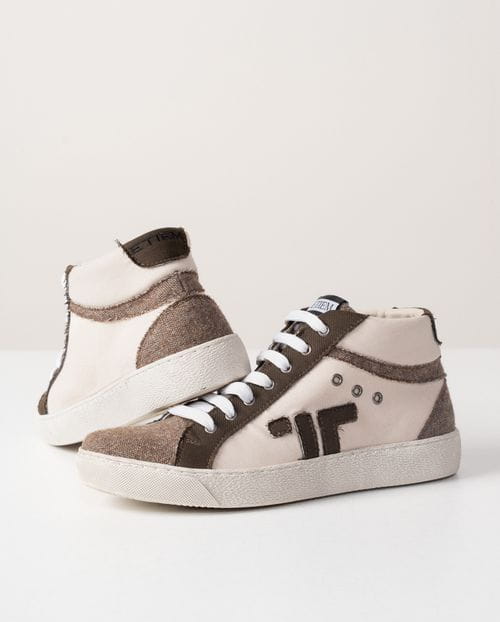 Low lace-up anckle boot made in combined fabrics